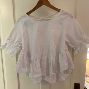 white ruffled shirt